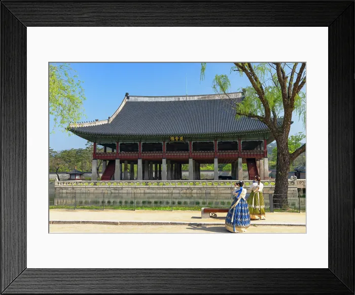 Framed Print : Women wearing traditional hanbok dresses in front of Gyeonghoeru Pavilion inside Gyeongbokgung Palace, Seoul, Seoul Metropolitan Area, South Korea Framed Print : Women wearing traditional hanbok dresses in front of Gyeonghoeru Pavilion inside Gyeongbokgung Palace, Seoul, Seoul Metropolitan Area, South Korea