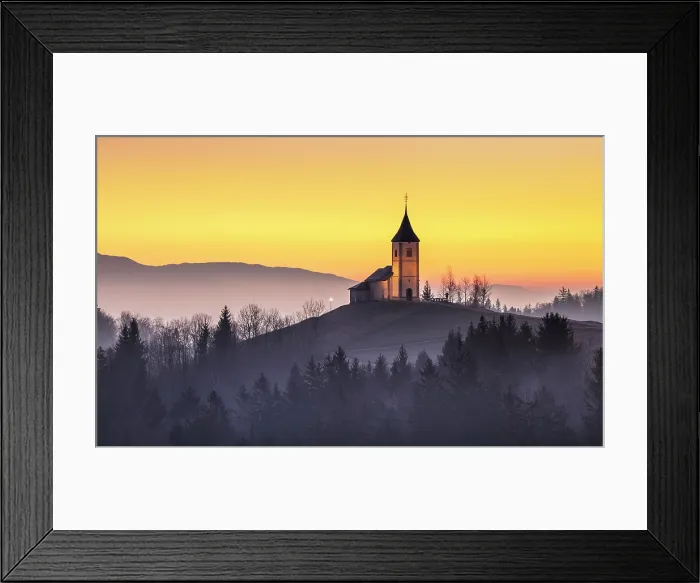 Framed Print : Church of St. Primoz and Felician against a golden sky at dawn, in winter, Jamnik, Slovenia Framed Print : Church of St. Primoz and Felician against a golden sky at dawn, in winter, Jamnik, Slovenia