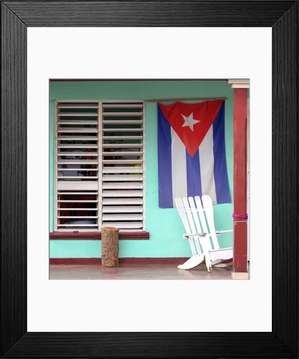 Framed Print : Traditional rocking chair and Cuban flag on the front porch of a house in Vinales, Pinar del Rio Province, Cuba Framed Print : Traditional rocking chair and Cuban flag on the front porch of a house in Vinales, Pinar del Rio Province, Cuba