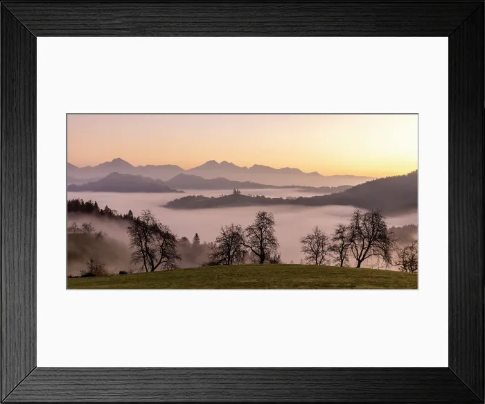 Framed Print : Church of St. Thomas and the Kamink Savinja Alps at sunrise, in autumn, Skofja Loka, Slovenia Framed Print : Church of St. Thomas and the Kamink Savinja Alps at sunrise, in autumn, Skofja Loka, Slovenia