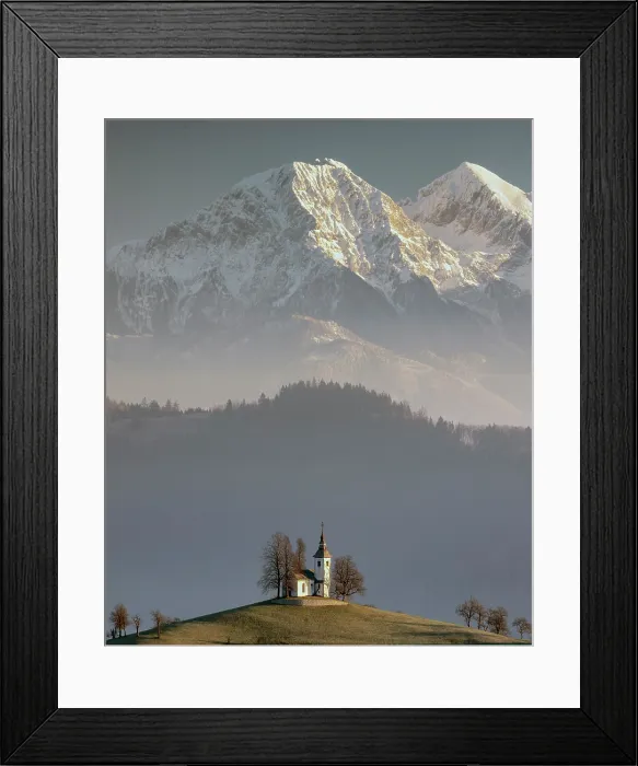 Framed Print : Church of St. Thomas and the Kamink Savinja Alps in winter, Skofja Loka, Slovenia Framed Print : Church of St. Thomas and the Kamink Savinja Alps in winter, Skofja Loka, Slovenia