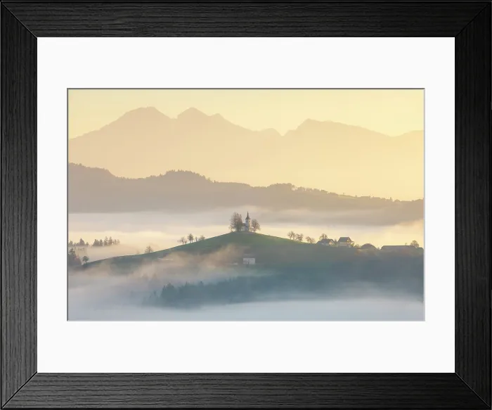 Framed Print : Church of St. Thomas and the Kamink Savinja Alps at sunrise, in autumn, Skofja Loka, Slovenia