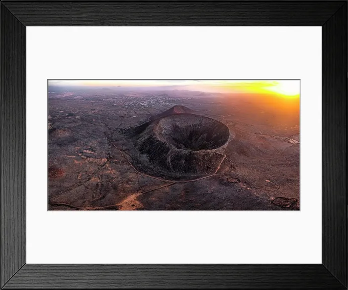 Framed Print : Majestic crater of Calderon Hondo volcano under a burning sky at sunset, aerial view, Fuerteventura, Canary Islands, Spain Framed Print : Majestic crater of Calderon Hondo volcano under a burning sky at sunset, aerial view, Fuerteventura, Canary Islands, Spain