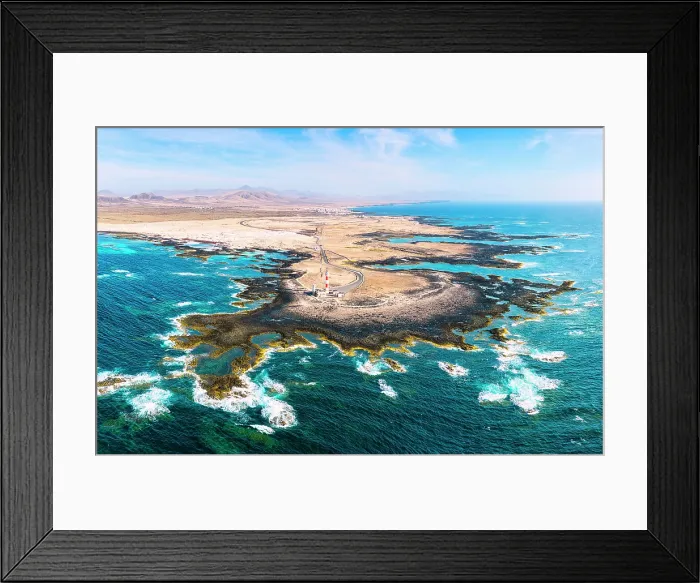 Framed Print : Aerial panoramic of El Toston lighthouse on cliffs washed by waves, El Cotillo, Fuerteventura, Canary Islands, Spain Framed Print : Aerial panoramic of El Toston lighthouse on cliffs washed by waves, El Cotillo, Fuerteventura, Canary Islands, Spain