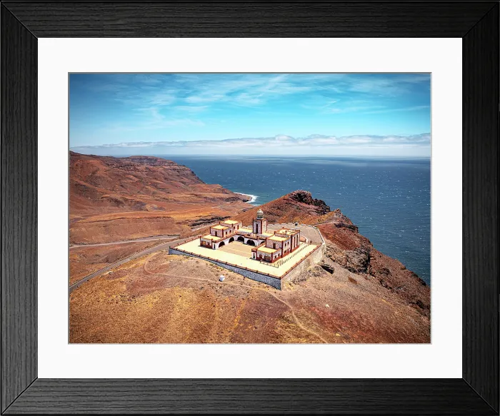 Framed Print : Aerial view of Entallada lighthouse on majestic cliffs overlooking the ocean, Tuineje, Fuerteventura, Canary Islands, Spain