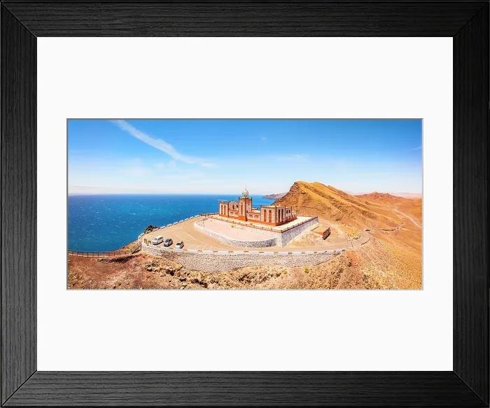 Framed Print : Aerial view of Entallada lighthouse on majestic cliffs overlooking the ocean, Tuineje, Fuerteventura, Canary Islands, Spain Framed Print : Aerial view of Entallada lighthouse on majestic cliffs overlooking the ocean, Tuineje, Fuerteventura, Canary Islands, Spain