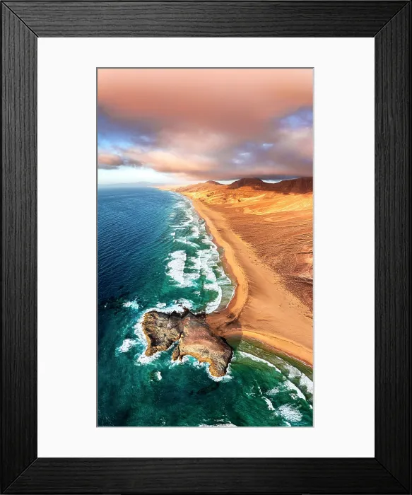 Framed Print : Pink clouds at sunset over the golden sand of Cofete beach and headland, Jandia Nature Park, Fuerteventura, Canary Islands Framed Print : Pink clouds at sunset over the golden sand of Cofete beach and headland, Jandia Nature Park, Fuerteventura, Canary Islands