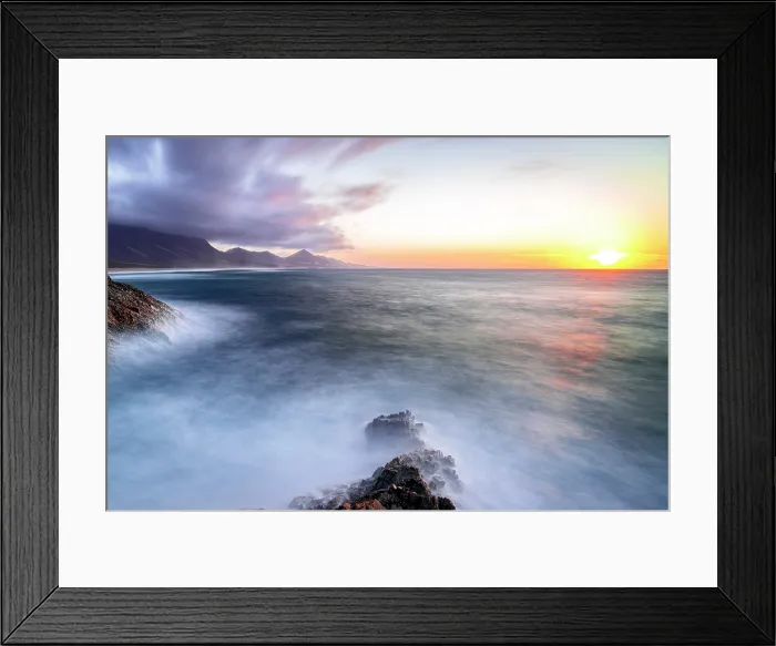 Framed Print : Long exposure of waves crashing on rocks surrounding Cofete Beach at sunset, Fuerteventura, Canary Islands, Spain Framed Print : Long exposure of waves crashing on rocks surrounding Cofete Beach at sunset, Fuerteventura, Canary Islands, Spain