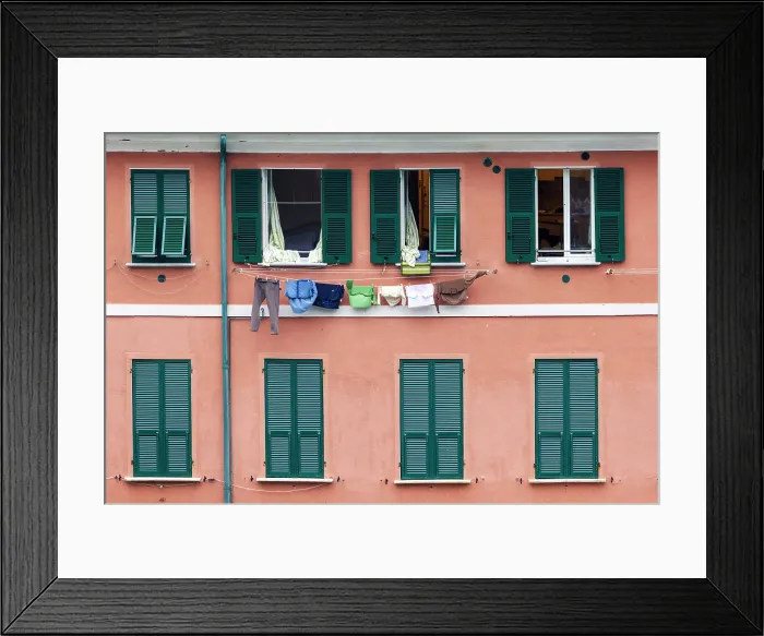 Framed Print : Laundry hanging on the wall of a house with green window shutters, Vernazza, Cinque Terre, La Spezia district, Liguria, Italy Framed Print : Laundry hanging on the wall of a house with green window shutters, Vernazza, Cinque Terre, La Spezia district, Liguria, Italy