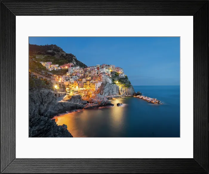 Framed Print : The village of Manarola at dusk, Cinque Terre, La Spezia district, Liguria, Italy Framed Print : The village of Manarola at dusk, Cinque Terre, La Spezia district, Liguria, Italy