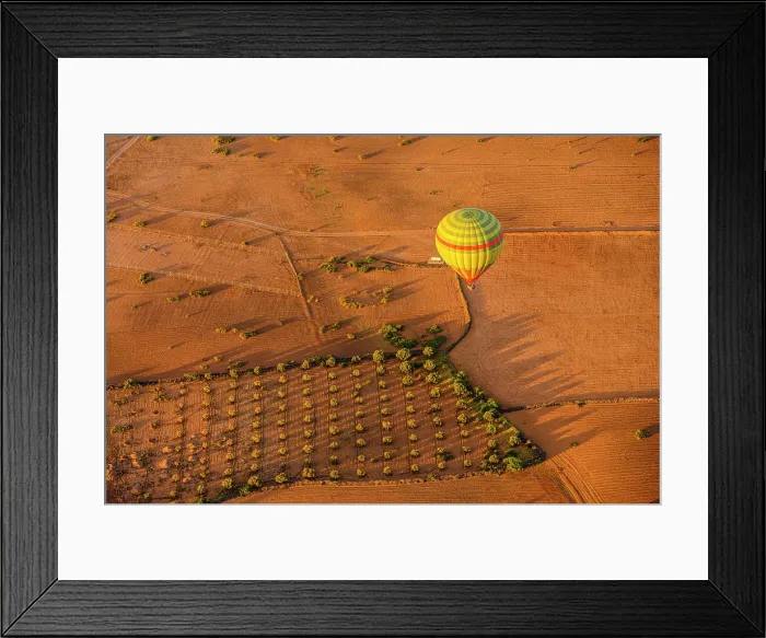 Framed Print : Hot air balloon over the Moroccan landscape, Marrakech, Morocco Framed Print : Hot air balloon over the Moroccan landscape, Marrakech, Morocco