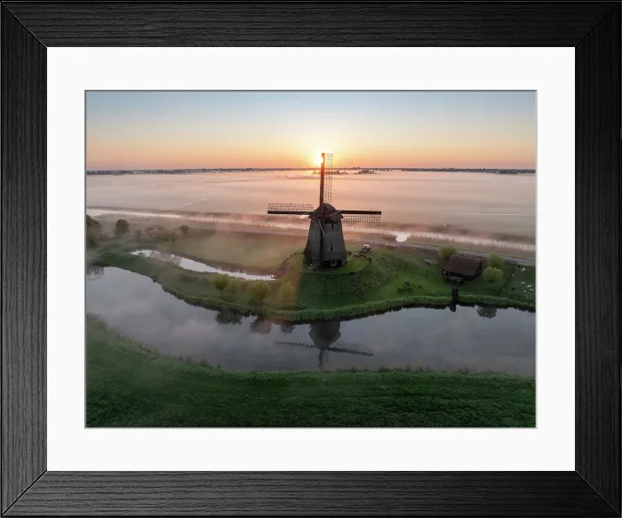 Framed Print : An aerial view of a windmill in the mist at dawn, North Holland, Netherlands Framed Print : An aerial view of a windmill in the mist at dawn, North Holland, Netherlands