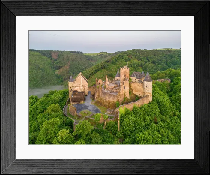 Framed Print : Aerial view at Bourscheid Castle in the Sauer Valley in morning fog, canton Diekirch, Luxembourg Framed Print : Aerial view at Bourscheid Castle in the Sauer Valley in morning fog, canton Diekirch, Luxembourg