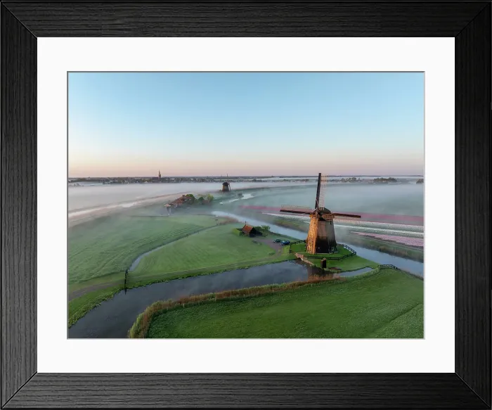 Framed Print : An aerial view of windmills & Schermerhorn in the mist at dawn, North Holland, Netherlands Framed Print : An aerial view of windmills & Schermerhorn in the mist at dawn, North Holland, Netherlands