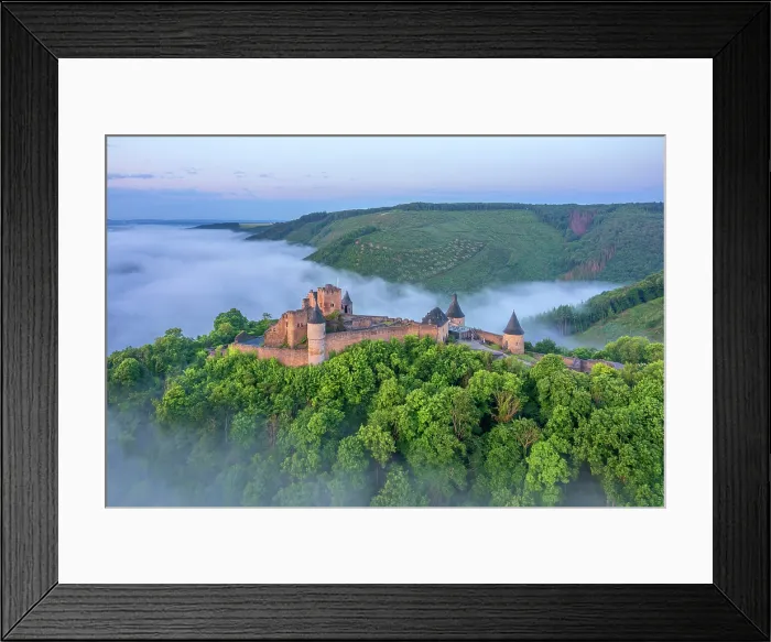 Framed Print : Aerial view at Bourscheid Castle in the Sauer Valley in morning fog, canton Diekirch, Luxembourg Framed Print : Aerial view at Bourscheid Castle in the Sauer Valley in morning fog, canton Diekirch, Luxembourg