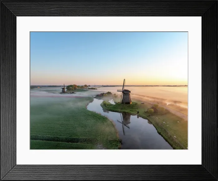 Framed Print : An aerial view of a windmill in the mist at dawn, North Holland, Netherlands Framed Print : An aerial view of a windmill in the mist at dawn, North Holland, Netherlands