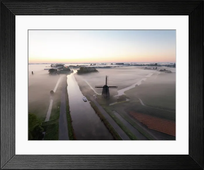 Framed Print : An aerial view of a windmill in the mist at dawn, North Holland, Netherlands Framed Print : An aerial view of a windmill in the mist at dawn, North Holland, Netherlands