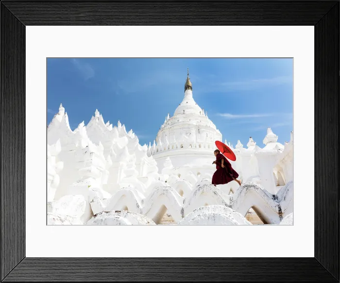 Framed Print : Young Buddhist monk running along a wall at Hsinbyume Pagoda, Mingun, Sagaing Region, Myanmar (Burma), Asia