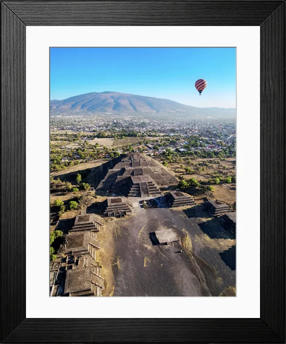 Framed Print : Hot air balloon flying over the Avenue of the Dead and the Pyramid of the Moon at sunrise, aerial view, Teotihuacan, Mexico State, Mexico Framed Print : Hot air balloon flying over the Avenue of the Dead and the Pyramid of the Moon at sunrise, aerial view, Teotihuacan, Mexico State, Mexico