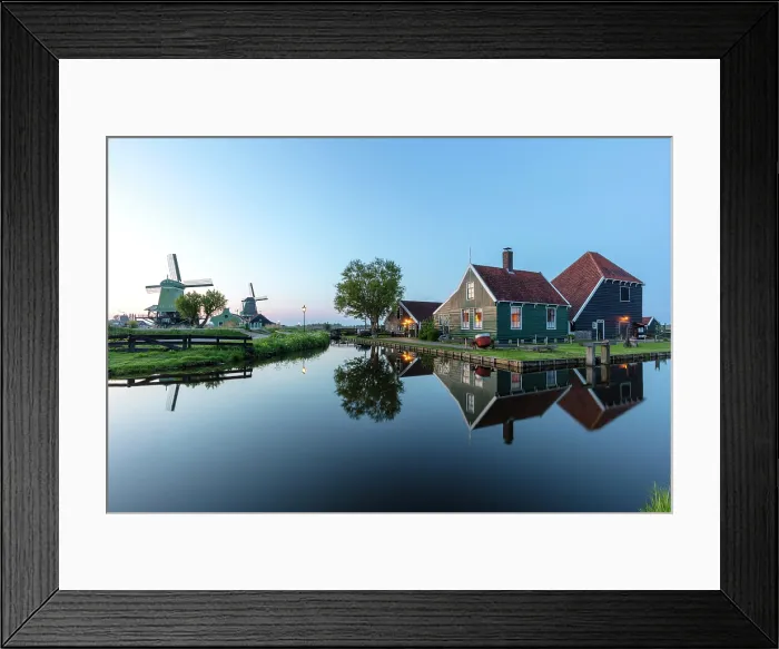 Framed Print : Traditional wooden houses reflected in a canal, Zaanse Schans, North Holland, Netherlands Framed Print : Traditional wooden houses reflected in a canal, Zaanse Schans, North Holland, Netherlands