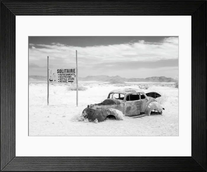 Framed Print : Infrared view of the shell of an old car at the remote settlement of Solitaire, Khomas Region, Namibia Framed Print : Infrared view of the shell of an old car at the remote settlement of Solitaire, Khomas Region, Namibia