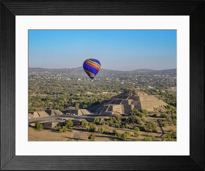 Framed Print : Hot air balloon flying over the Avenue of the Dead and the Pyramid of the Moon at sunrise, aerial view, Teotihuacan, Mexico State, Mexico Framed Print : Hot air balloon flying over the Avenue of the Dead and the Pyramid of the Moon at sunrise, aerial view, Teotihuacan, Mexico State, Mexico