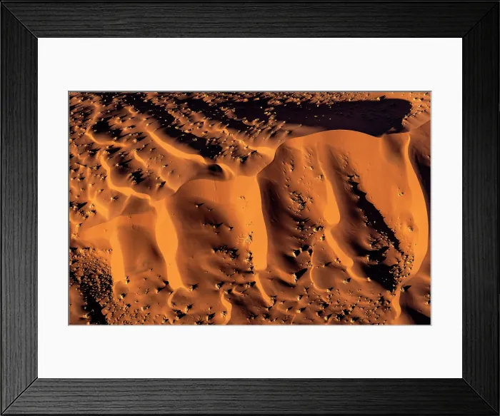 Framed Print : Aerial view of golden sand dunes at sunrise, Sossusvlei, Namib-Naukluft National Park, Namib Desert, Namibia Framed Print : Aerial view of golden sand dunes at sunrise, Sossusvlei, Namib-Naukluft National Park, Namib Desert, Namibia