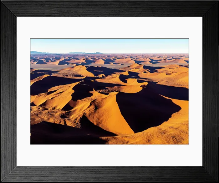 Framed Print : Aerial view of golden sand dunes at sunrise, Sossusvlei, Namib-Naukluft National Park, Namib Desert, Namibia Framed Print : Aerial view of golden sand dunes at sunrise, Sossusvlei, Namib-Naukluft National Park, Namib Desert, Namibia