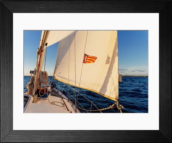 Framed Print : Sailboat's Catalan flag billows, open sea. Majorca, Balearic Islands, Spain Framed Print : Sailboat's Catalan flag billows, open sea. Majorca, Balearic Islands, Spain