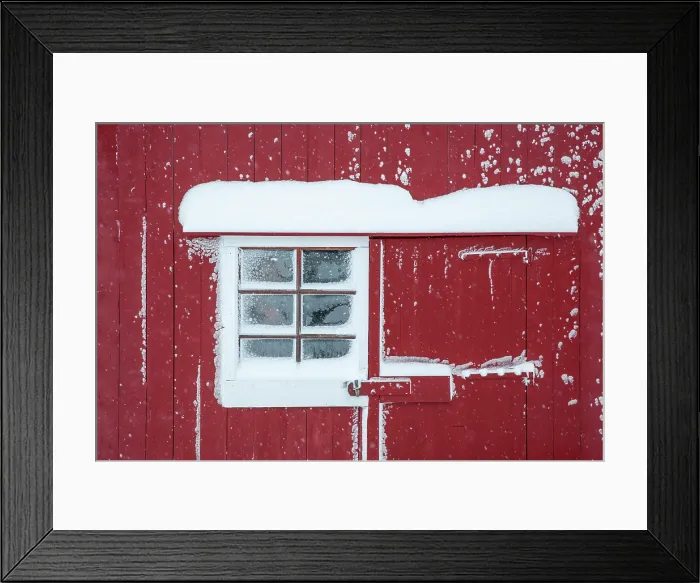 Framed Print : Wall of red timber rorbu (cabin) covered in snow, Bergsbotn, Senja, Norway