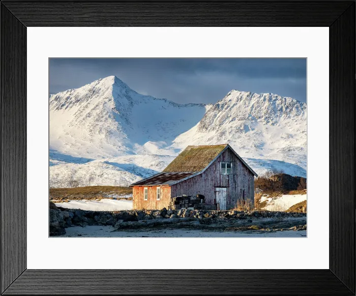Framed Print : Old red wooden barn (rorbu) and snow-covered mountains, Sommeroy, near Tromso, Norway Framed Print : Old red wooden barn (rorbu) and snow-covered mountains, Sommeroy, near Tromso, Norway