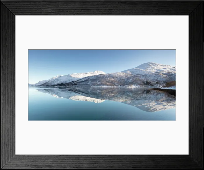Framed Print : Snow-covered mountains with a perfect reflection in flat calm waters of a fjord, island of Kvaloya, near Tromso, Norway Framed Print : Snow-covered mountains with a perfect reflection in flat calm waters of a fjord, island of Kvaloya, near Tromso, Norway