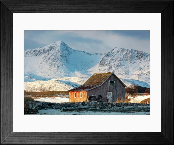Framed Print : Old red wooden barn (rorbu) and snow-covered mountains, Sommeroy, near Tromso, Norway Framed Print : Old red wooden barn (rorbu) and snow-covered mountains, Sommeroy, near Tromso, Norway