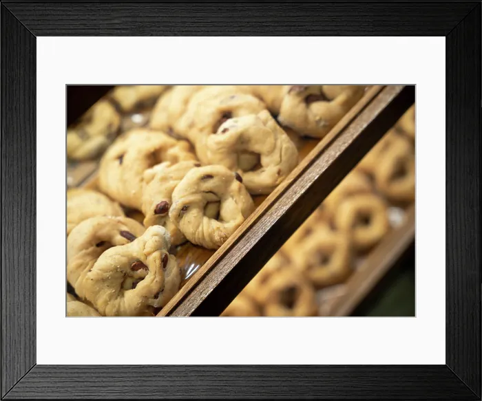 Framed Print : Neapolitan taralli with almonds, a traditional savory snack, displayed in Naples, Italy Framed Print : Neapolitan taralli with almonds, a traditional savory snack, displayed in Naples, Italy