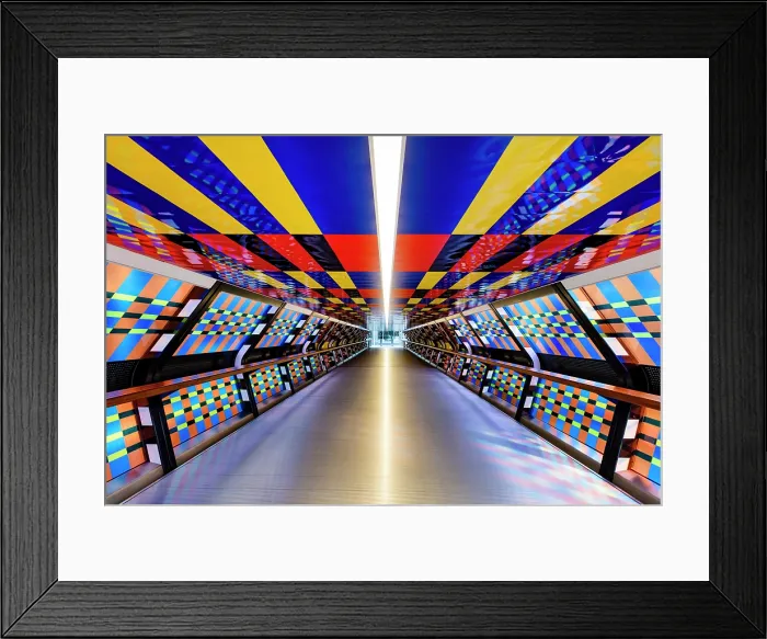 Framed Print : The Adam Plaza Bridge, with colourful light installation by Camille Walala, Canary Wharf, London, England Framed Print : The Adam Plaza Bridge, with colourful light installation by Camille Walala, Canary Wharf, London, England