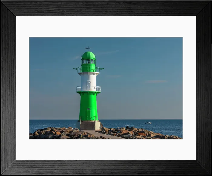 Framed Print : Lighthouse at the beach of Warnemunde, Baltic Sea, Mecklenburg-Western Pomerania, Germany Framed Print : Lighthouse at the beach of Warnemunde, Baltic Sea, Mecklenburg-Western Pomerania, Germany