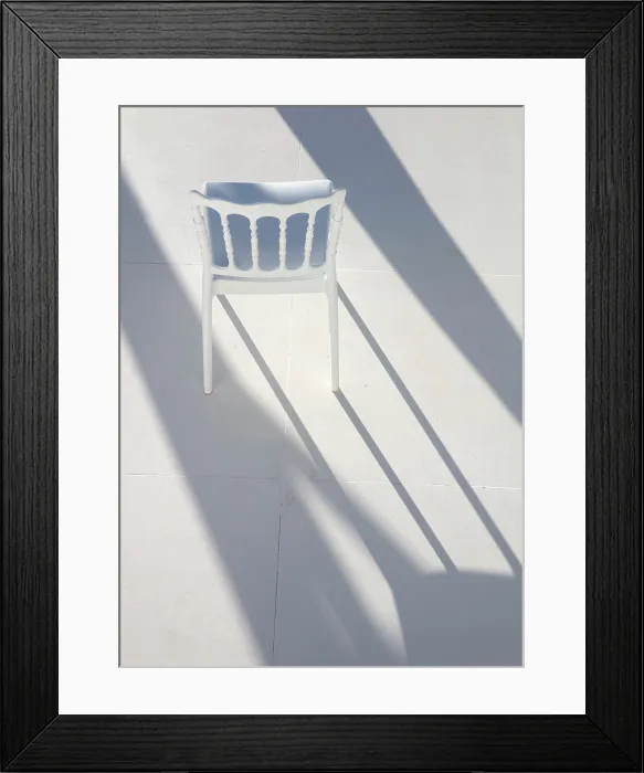 Framed Print : White chair and shadows, Imerovigli, Santorini, Cyclades Islands, Greece, Europe