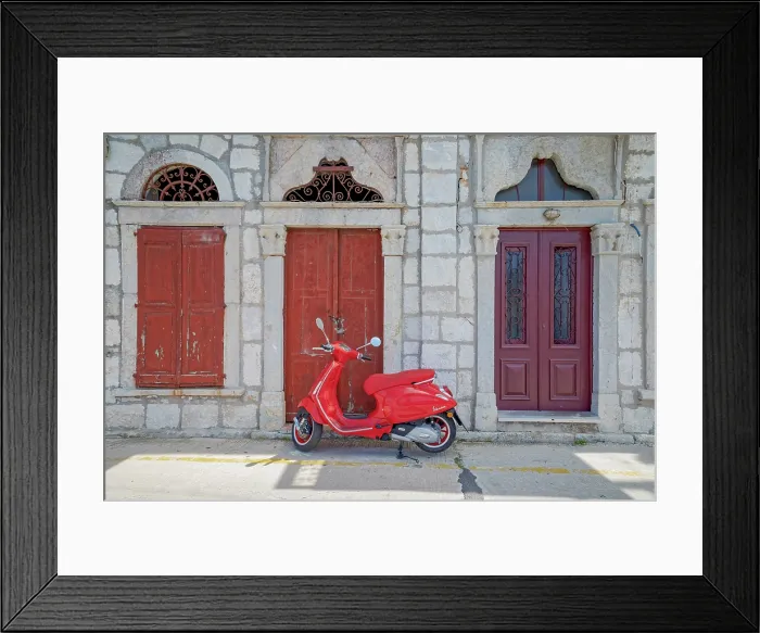Framed Print : Red vespa scooter parked in front of a old building, Gialos, Symi Island, Dodecanese Islands, Greece