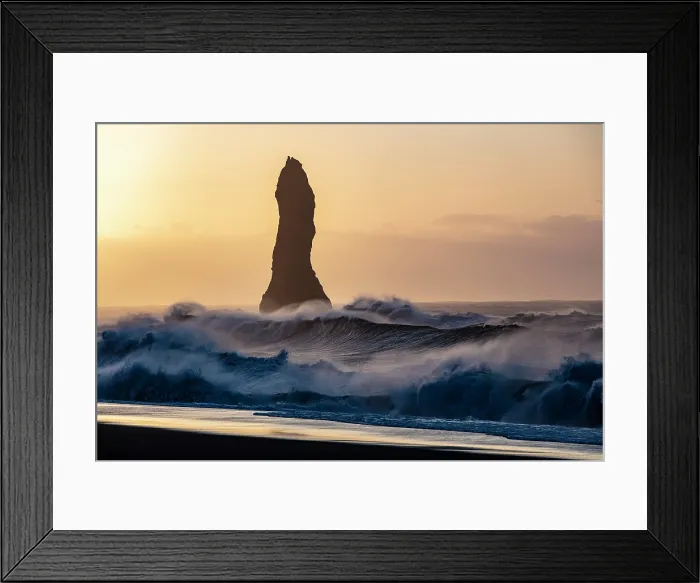 Framed Print : One of the Reynisdrangar rock stacks being pounded by waves, from Reynisfjara black sand beach, near Vik y Myrdal, South Iceland Framed Print : One of the Reynisdrangar rock stacks being pounded by waves, from Reynisfjara black sand beach, near Vik y Myrdal, South Iceland