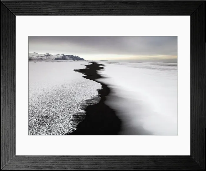 Framed Print : Black sand beach fringed by snow and surf, near Jokulsarlon, South Iceland Framed Print : Black sand beach fringed by snow and surf, near Jokulsarlon, South Iceland
