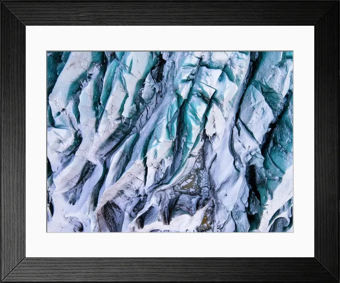 Framed Print : Top-down view of crevasses in Svinafellsjokull, an outlet glacier of the Vatnajokull ice cap, South Iceland Framed Print : Top-down view of crevasses in Svinafellsjokull, an outlet glacier of the Vatnajokull ice cap, South Iceland