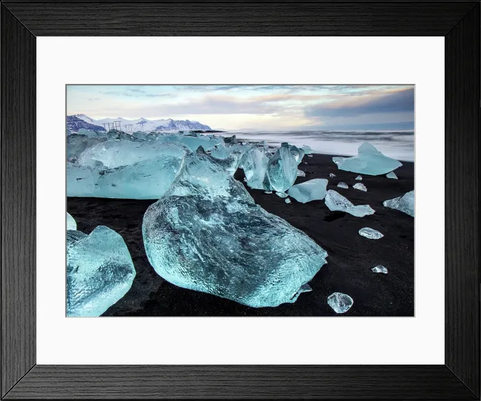 Framed Print : Black volcanic sand beach covered in icebergs from Jokulsarlon glacier lagoon at dawn, Southeast Iceland Framed Print : Black volcanic sand beach covered in icebergs from Jokulsarlon glacier lagoon at dawn, Southeast Iceland