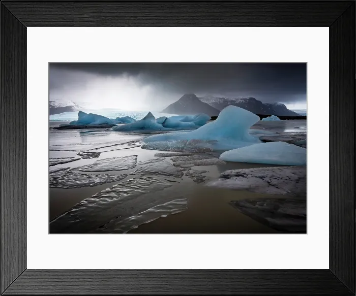 Framed Print : Blue icebergs and sheets of ice on the lagoon at Fjallsarlon, near Jokulsarlon, South Iceland Framed Print : Blue icebergs and sheets of ice on the lagoon at Fjallsarlon, near Jokulsarlon, South Iceland