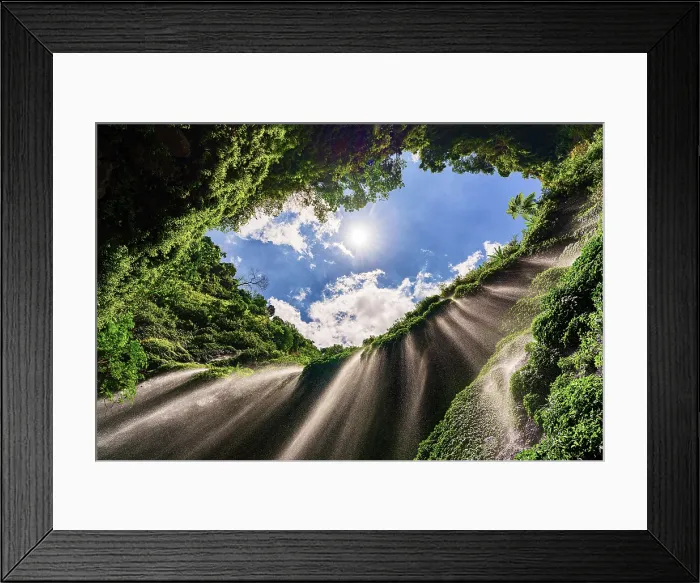 Framed Print : Low angle view of powerful stream of Madakaripura waterfall falling from cliff in the tropical rainforest, Bromo, Java, Indonesia Framed Print : Low angle view of powerful stream of Madakaripura waterfall falling from cliff in the tropical rainforest, Bromo, Java, Indonesia