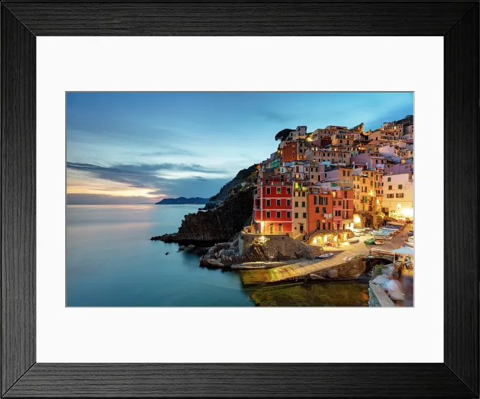 Framed Print : The colorful village of Riomaggiore at dusk, Cinque Terre, La Spezia district, Liguria, Italy Framed Print : The colorful village of Riomaggiore at dusk, Cinque Terre, La Spezia district, Liguria, Italy