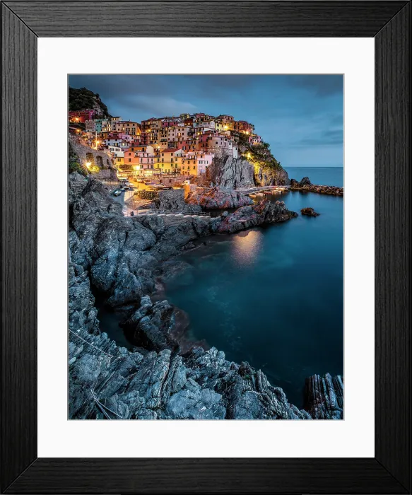 Framed Print : The village of Manarola at dusk, Cinque Terre, La Spezia district, Liguria, Italy Framed Print : The village of Manarola at dusk, Cinque Terre, La Spezia district, Liguria, Italy