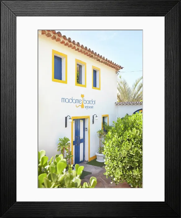 Framed Print : A detail of the Madame Bardot Restaurant on the Orla Bardot street in the historical cask of Buzios, Rio de Janeiro, Brazil Framed Print : A detail of the Madame Bardot Restaurant on the Orla Bardot street in the historical cask of Buzios, Rio de Janeiro, Brazil