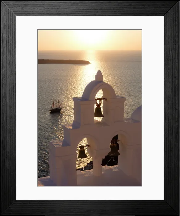 Framed Print : Triple belltower at sunset with yacht and caldera in the background, Firostephani, Santorini, Cyclades Islands, Greece, Europe Framed Print : Triple belltower at sunset with yacht and caldera in the background, Firostephani, Santorini, Cyclades Islands, Greece, Europe