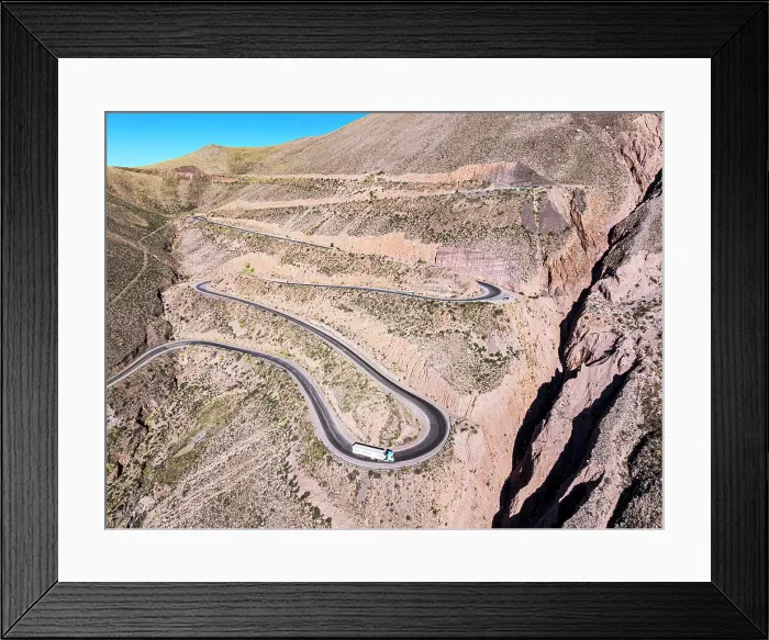 Framed Print : Truck on a winding mountain road, Purmamarca, Puna, Jujuy, Argentina Framed Print : Truck on a winding mountain road, Purmamarca, Puna, Jujuy, Argentina