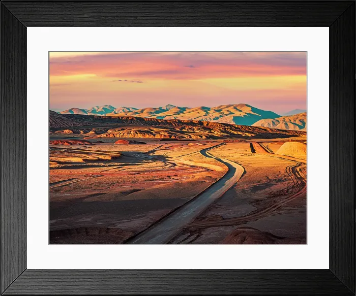 Framed Print : Road crossing the red landscape of Labyrinth desert, Puna, Salta, Argentina Framed Print : Road crossing the red landscape of Labyrinth desert, Puna, Salta, Argentina